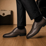 Melodiapelle Mangrove Plain Derby in brown leather worn with formal trousers, on-feet shot