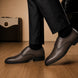 Melodiapelle Mangrove Plain Derby in brown leather worn with formal trousers, on-feet shot