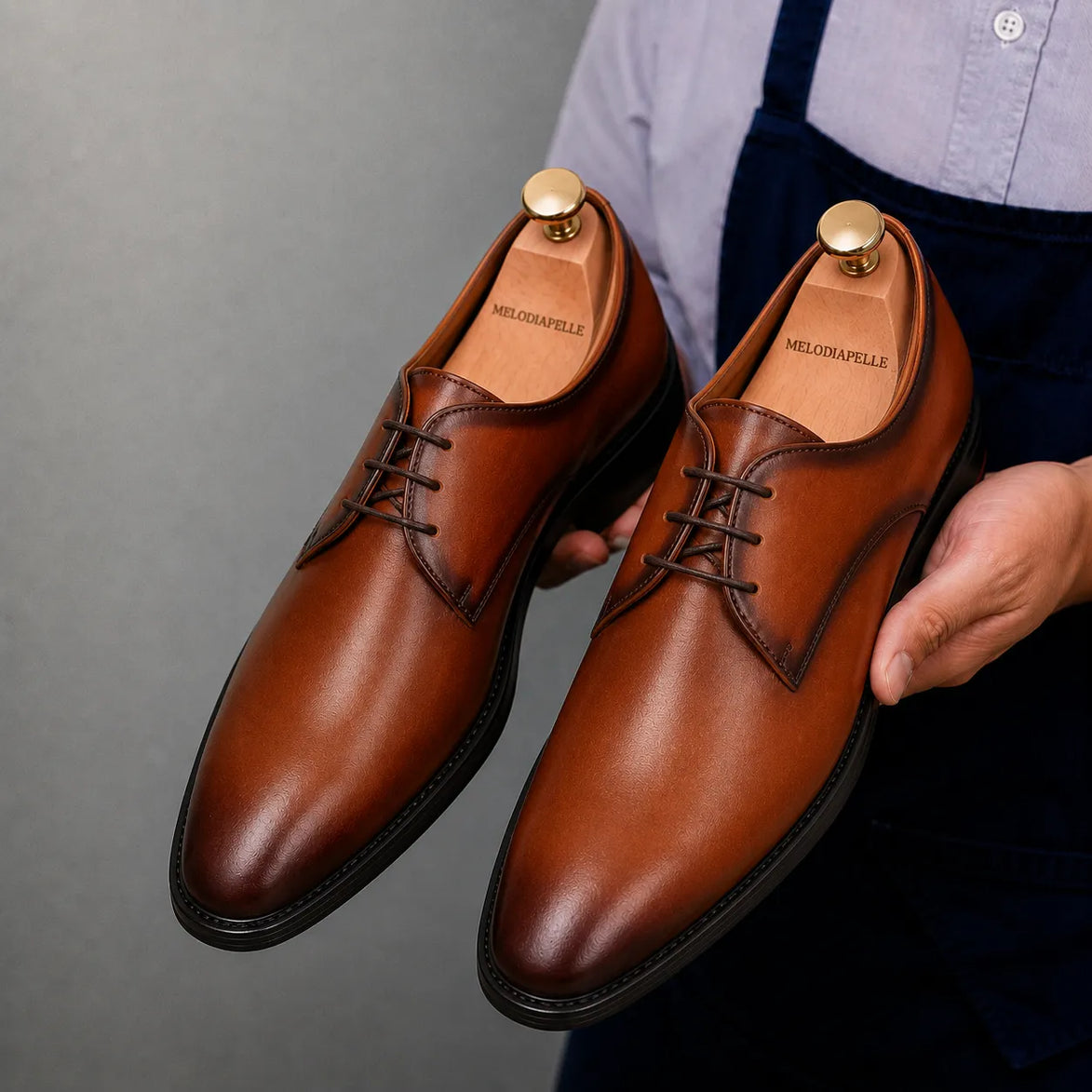 Melodiapelle Mangrove Plain Derby in cognac tan leather, styled close-up
