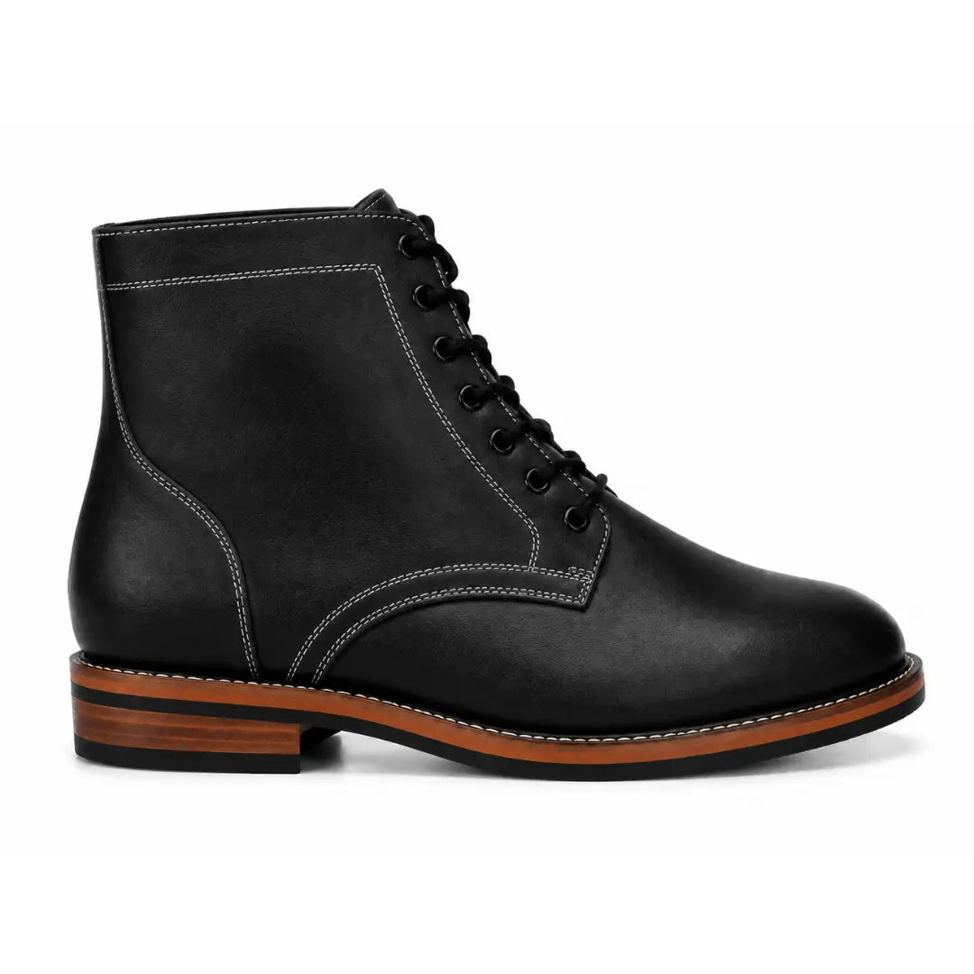Side profile of the Manila Plain Toe Boot in black leather on white background