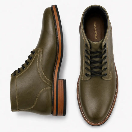 Olive green leather plain-toe boot, three-quarter angle showing heel and contrast stitching