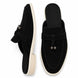 Black suede tassel mule loafer, three-quarter angle showing tassel and heel