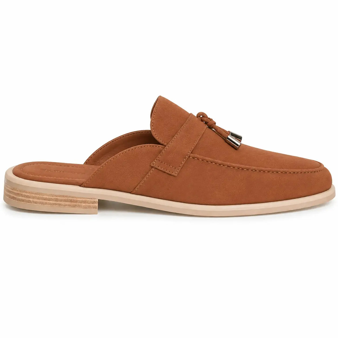 Side profile of the Manni Mule in tan rust suede on white background