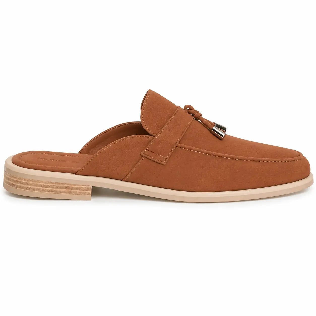 Side profile of the Manni Mule in tan rust suede on white background