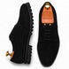 Black suede plain-toe Derby, three-quarter angle showing heel and sole detailing