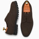 Dark brown suede plain-toe Derby, three-quarter angle showing heel and sole detailing
