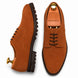 Rust tan suede plain-toe Derby, three-quarter angle showing heel and sole detailing