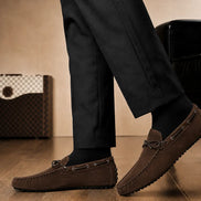 Melodiapelle Mansfield Loafer in dark brown suede worn with trousers, on-feet shot