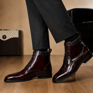 Melodiapelle Manteca Combat Boot in burgundy leather worn with trousers, on-feet shot