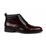 Side profile of the Manteca Combat Boot in burgundy leather on white background