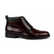 Side profile of the Manteca Combat Boot in burgundy leather on white background