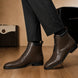 Melodiapelle Manteca Combat Boot in dark brown leather worn with trousers, on-feet shot