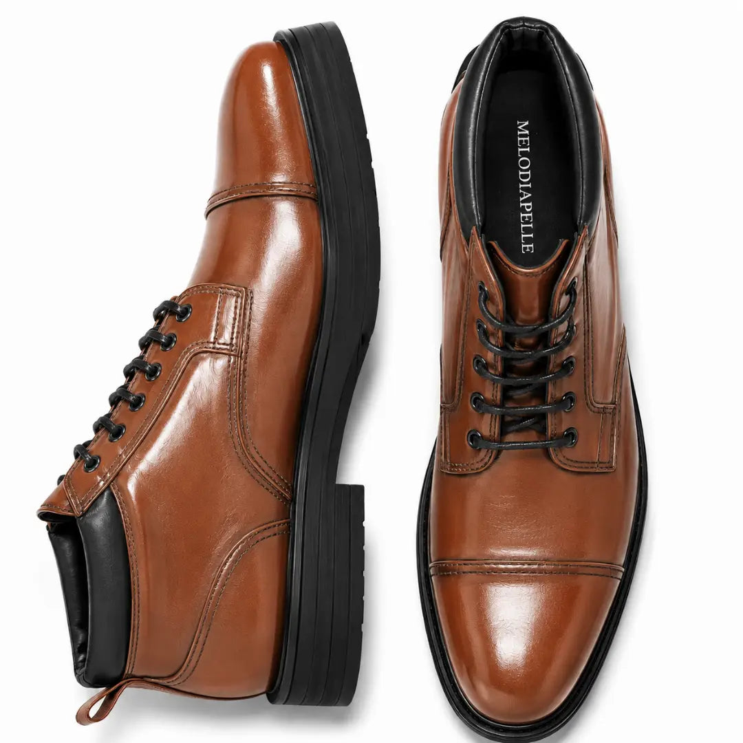 Tan leather combat boot, three-quarter angle showing heel and sole detailing