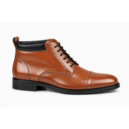 Side profile of the Manteca Combat Boot in tan leather on white background
