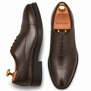 Brown leather semi-brogue Oxford, three-quarter angle showing heel and brogue detailing