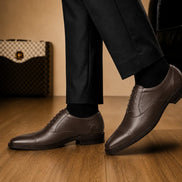 Melodiapelle Marcello Semi-Brogue Oxford in brown leather worn with formal trousers, on-feet shot