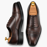 Marcello Semi-Brogue Oxford in chocolate brown leather, three-quarter angle showing heel and Goodyear-welted stitching
