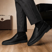  Melodiapelle Marengo Embossed Slip-On Sneaker in nero black leather worn with trousers, on-feet shot