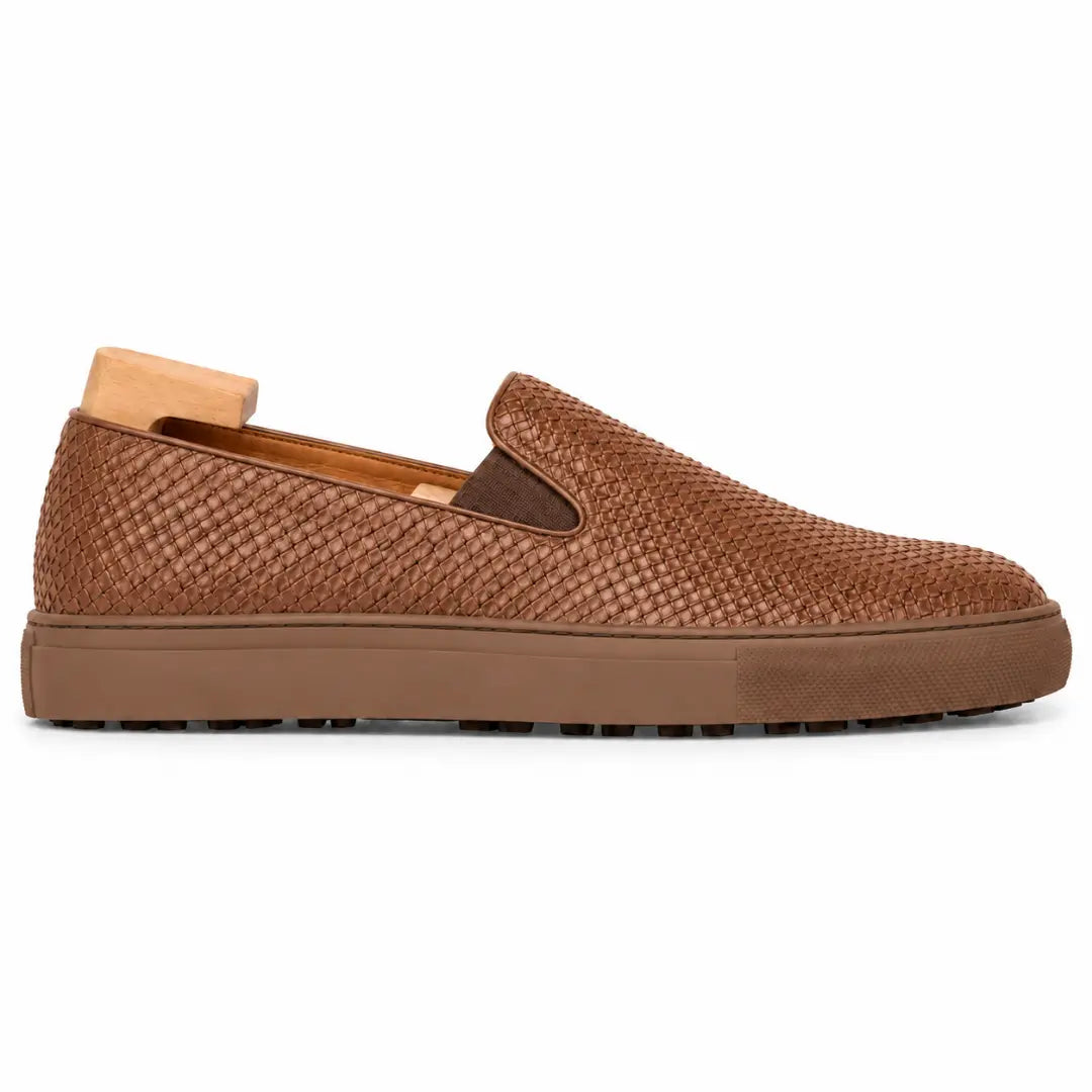 Side profile of the Marengo Embossed Slip-On Sneaker in tan leather on white background
