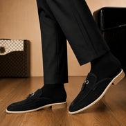 Melodiapelle Maria Mule in black suede worn with trousers, on-feet shot