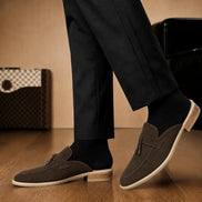 Melodiapelle Maria Mule in dark brown suede worn with trousers, on-feet shot