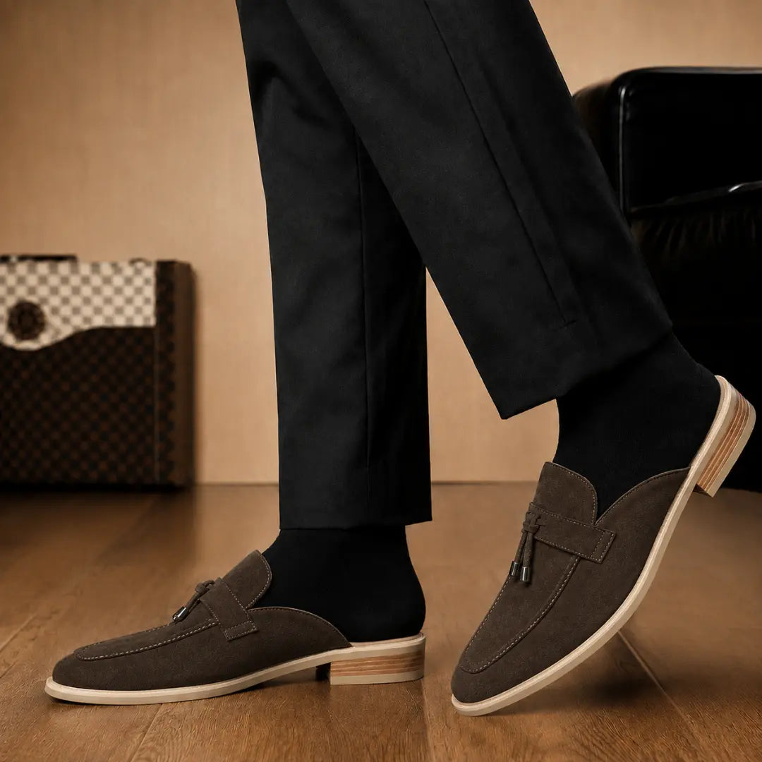 Melodiapelle Maria Mule in dark brown suede worn with trousers, on-feet shot