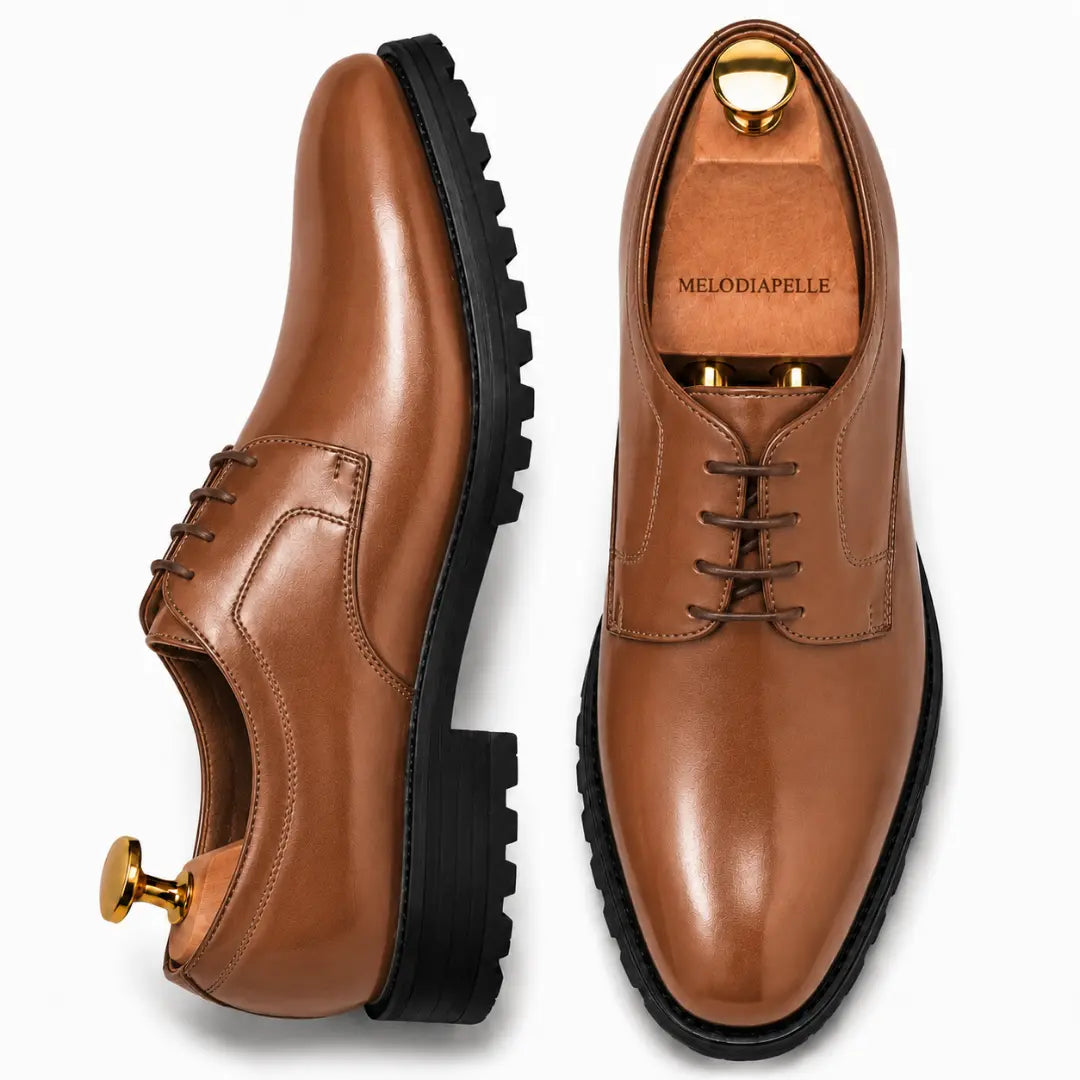 Tan leather plain-toe Derby, three-quarter angle showing heel and sole detailing