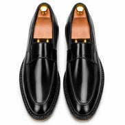 Melodiapelle Marquis Dress Penny Loafer in black leather, pair top-down view, handcrafted in Agra