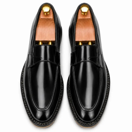 Melodiapelle Marquis Dress Penny Loafer in black leather, pair top-down view, handcrafted in Agra