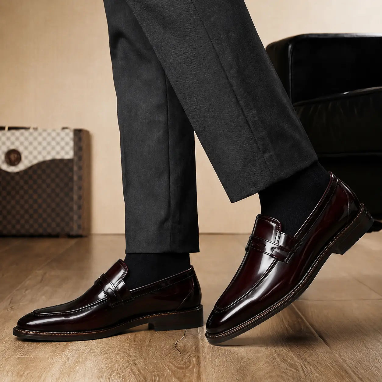 Melodiapelle Marquis Dress Penny Loafer in oxblood burgundy leather worn with formal trousers, on-feet shot