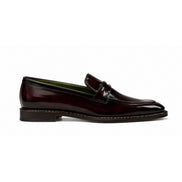 Side profile of the Marquis Dress Penny Loafer in oxblood burgundy leather on white background
