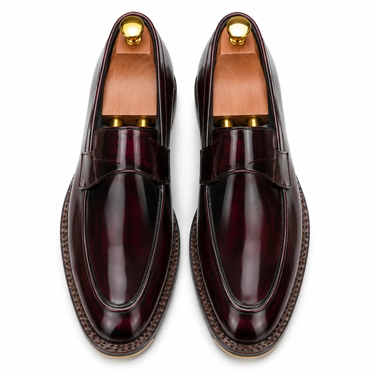 Melodiapelle Marquis Dress Penny Loafer in oxblood burgundy leather, pair top-down view, handcrafted in Agra
