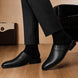 Melodiapelle Marshall Mule in black leather worn with trousers, on-feet shot