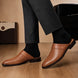Melodiapelle Marshall Mule in tan leather worn with trousers, on-feet shot