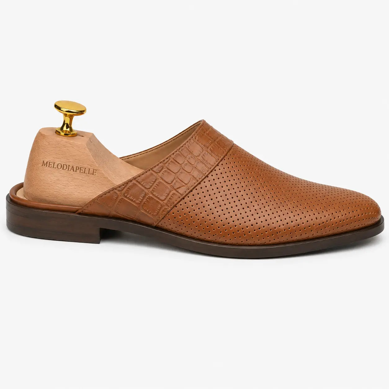 Side profile of the Marshall Mule in tan leather on white background