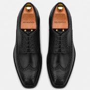 Melodiapelle Marshfield Wingtip Brogue Oxford in black leather, pair top-down view, handcrafted in Agra