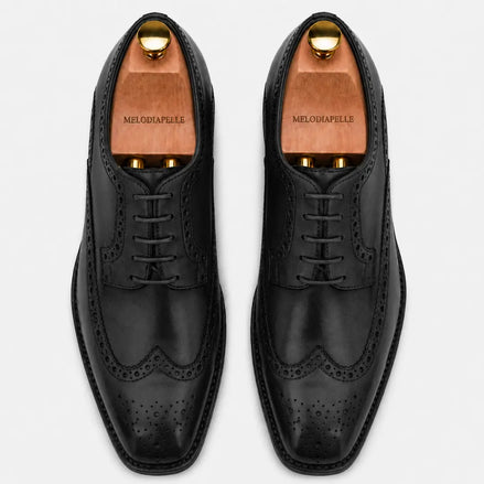 Melodiapelle Marshfield Wingtip Brogue Oxford in black leather, pair top-down view, handcrafted in Agra