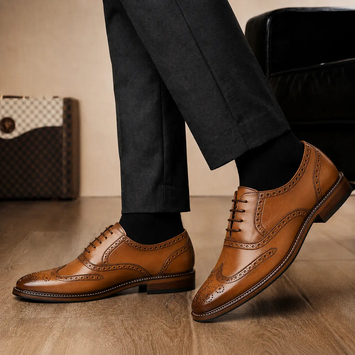 Melodiapelle Marshfield Wingtip Brogue Oxford in olive khaki leather worn with formal trousers, on-feet shot