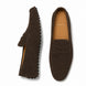 Dark brown suede penny loafer, three-quarter angle showing sole detailing