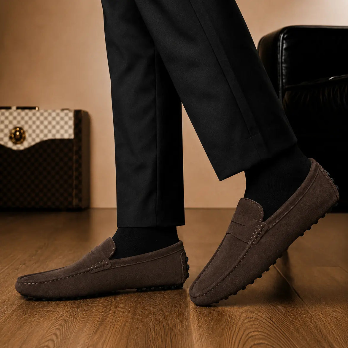 Melodiapelle Maryland Loafer in dark brown suede worn with trousers, on-feet shot