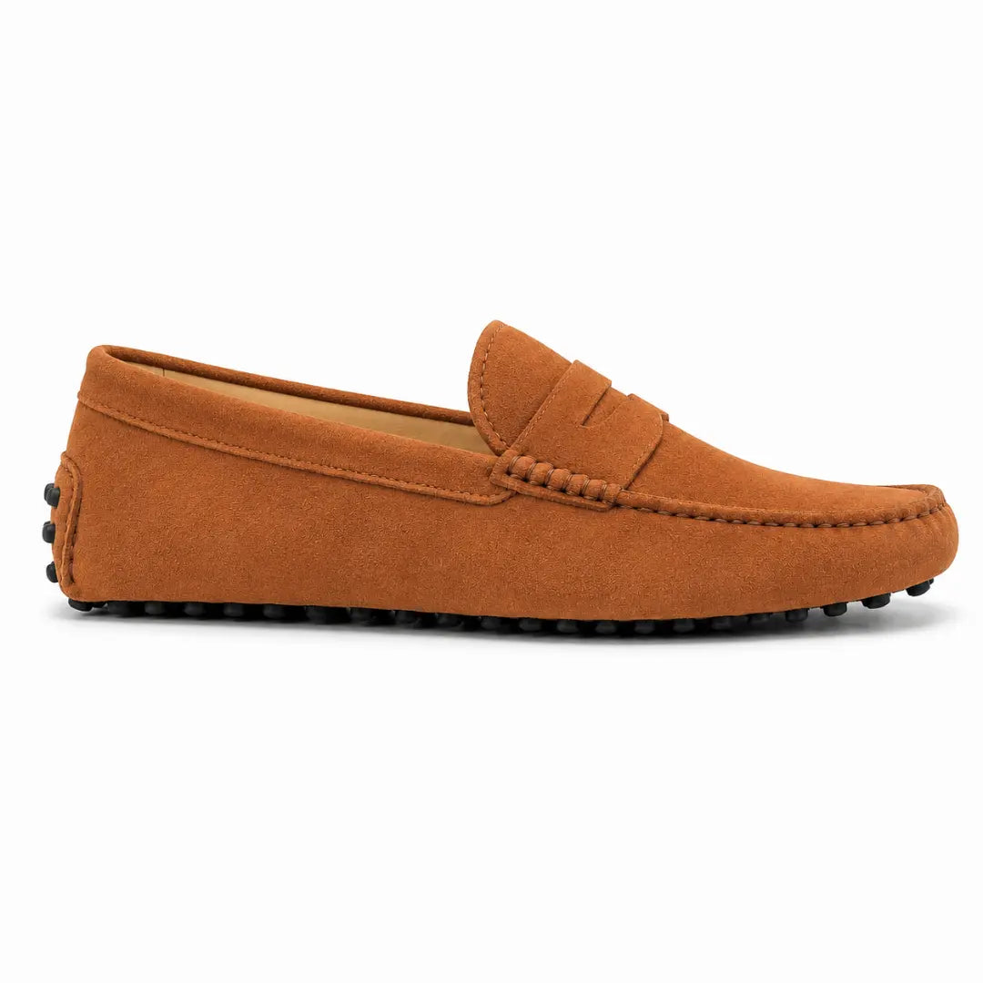 Side profile of the Maryland Loafer in rust tan suede on white background