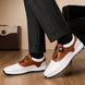 Melodiapelle Marzano BOA Golf Shoe in white and tan leather worn with trousers, on-feet shot