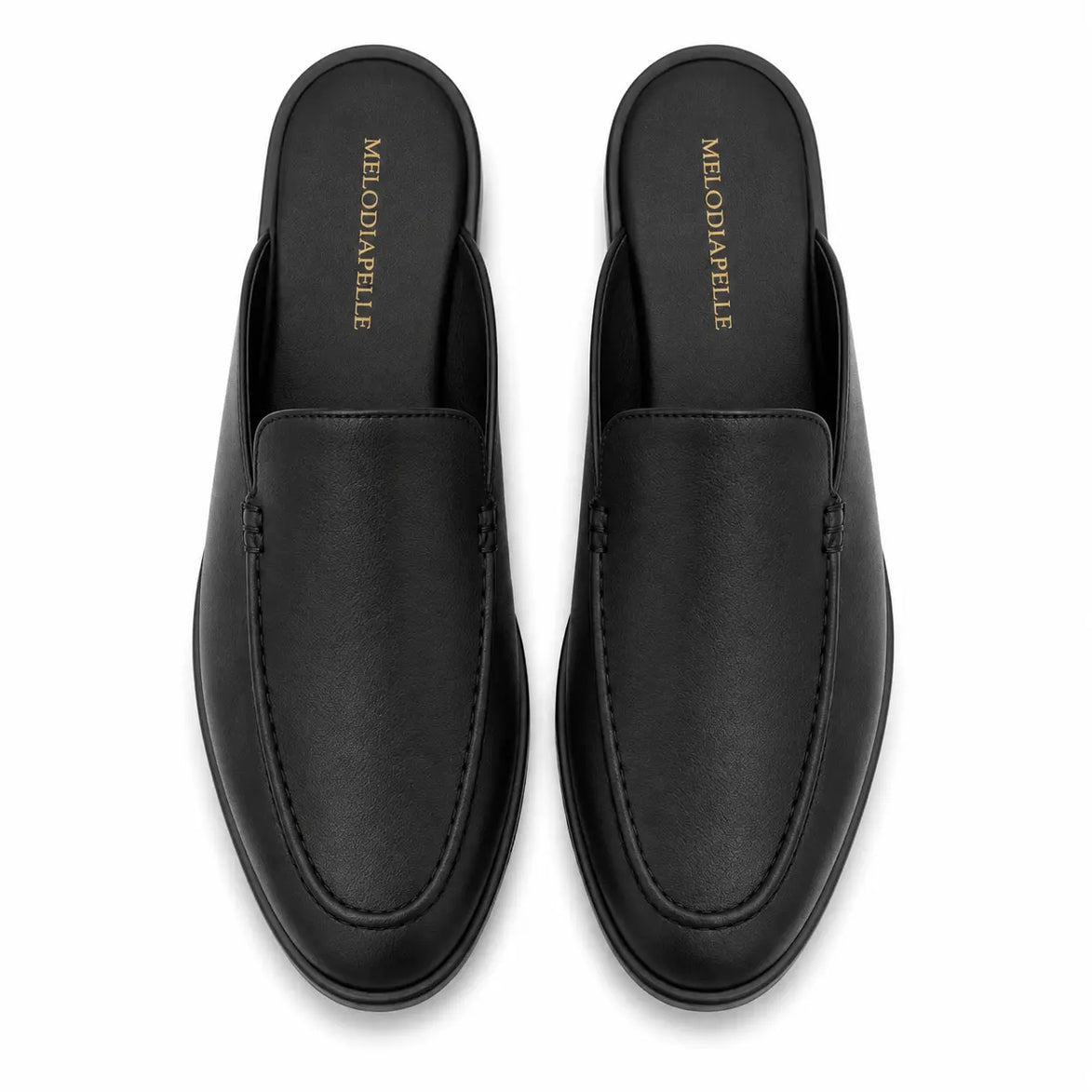 Melodiapelle Massimo Mule in black leather, pair top-down view, handcrafted in Agra