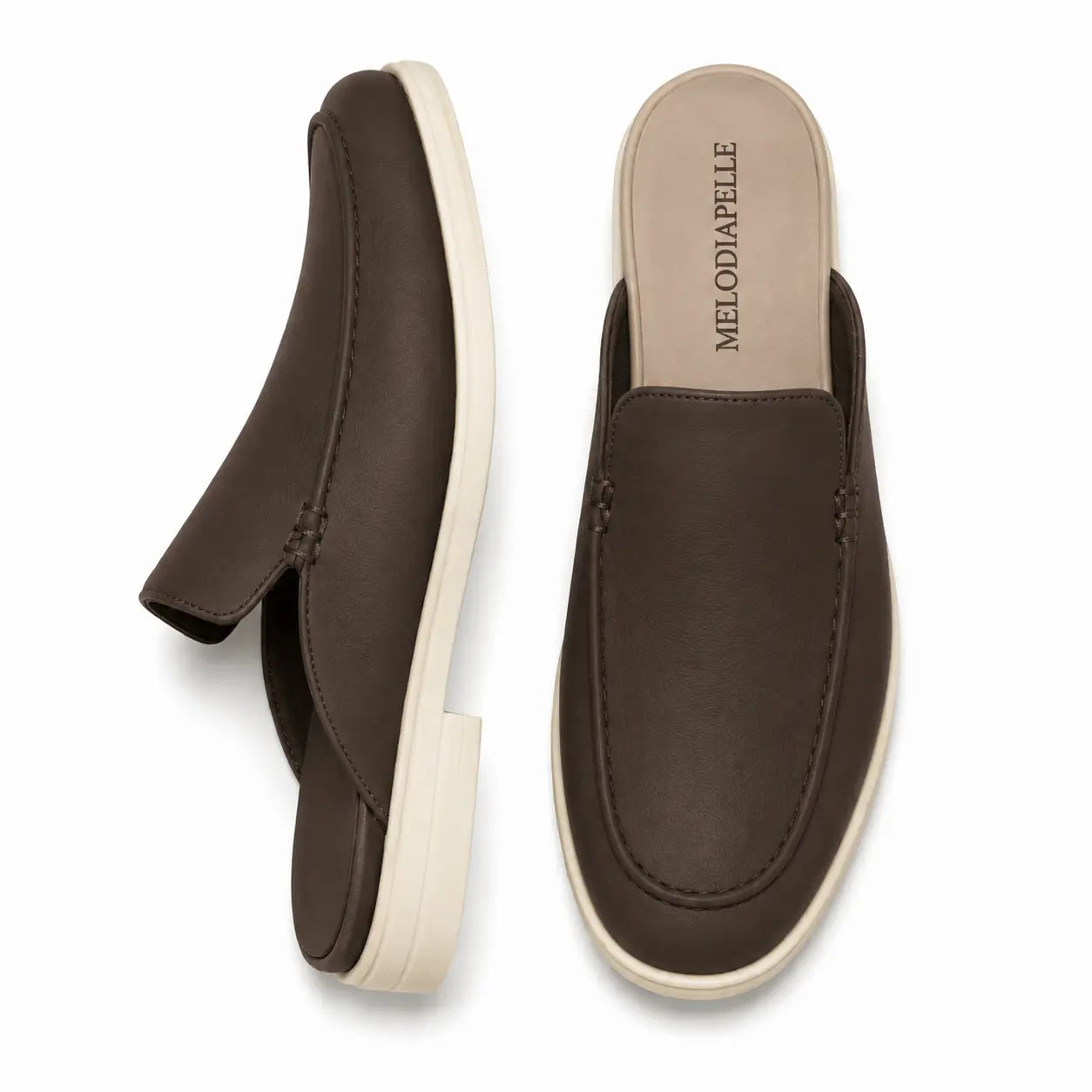 Dark brown leather backless mule loafer, three-quarter angle showing heel and sole detailing