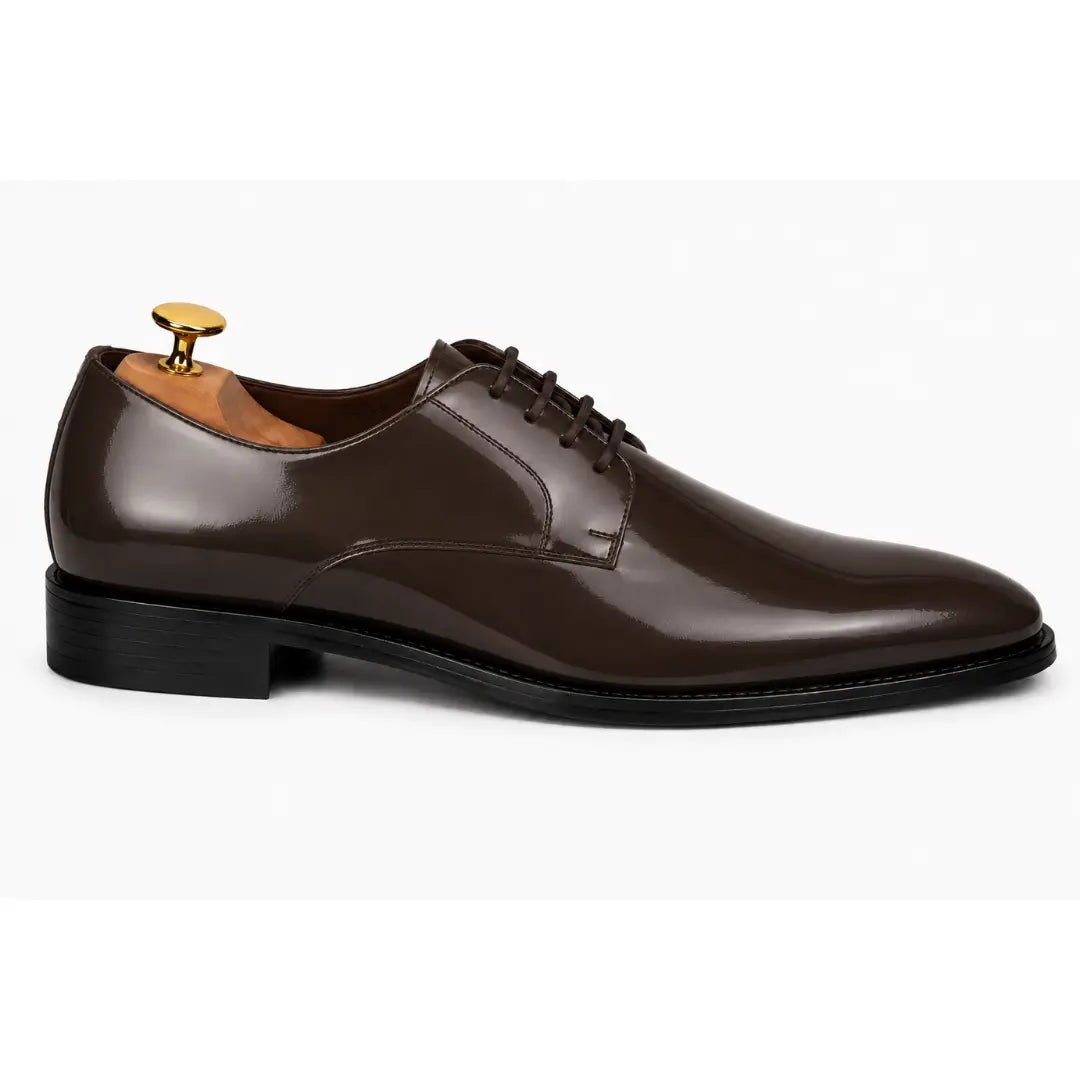 Side profile of the Matera Plain-Toe Derby in brown leather on white background
