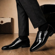Melodiapelle Matera Plain-Toe Derby in nero black leather worn with formal trousers, on-feet shot