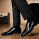 Melodiapelle Matera Plain-Toe Derby in nero black leather worn with formal trousers, on-feet shot