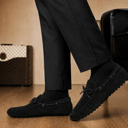Melodiapelle Mathews Loafer in black suede worn with trousers, on-feet shot