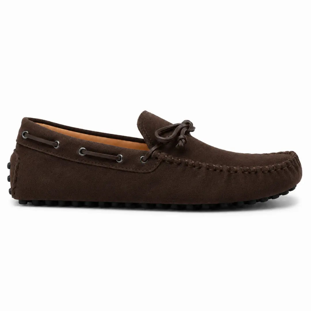 Side profile of the Mathews Loafer in dark brown suede on white background
