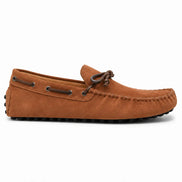 Side profile of the Mathews Loafer in rust tan suede on white background
